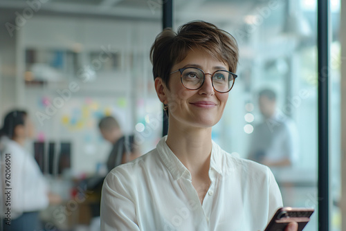 A photo of an attractive senior business woman with short hair.