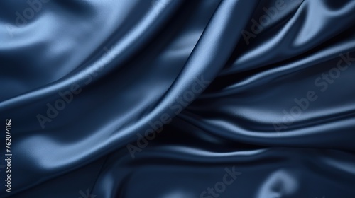 close up of smooth shiny blue silk satin fabric