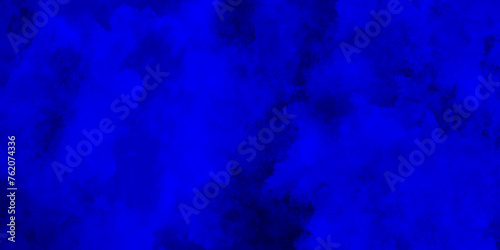Abstract smoky and grunge blue texture with grunge effect, grunge blue background texture with grainy smoke effect, watercolor painted mottled blue background with vintage marbled texture.