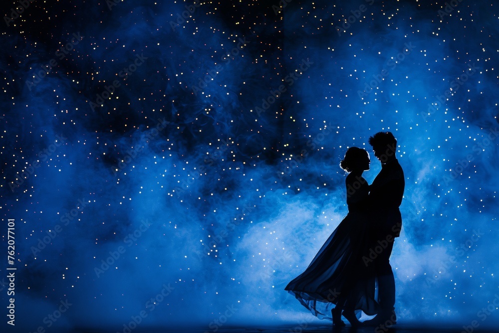 Silhouette of a couple dancing with smoke under a starry night ballroom scene. Silhouette of a couple dancing with smoke under a starry night ballroom scene.
