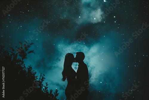 Silhouette of a couple stargazing with smoke effects under a starry night.