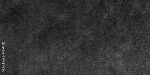 Black textured concrete floor or old grunge texture, cement floor old black elegant vintage distressed blackboard or chalkboard texture, Rock abstract black wall or concrete or plaster background.