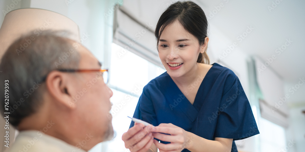Obraz premium Health insurance service, Young Asian caregiver nurse examine senior man or woman patient at home. Attractive specialist career female support give advise and therapy consult to older elderly mature