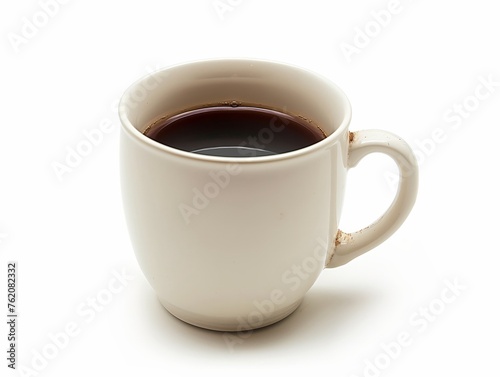 A classic white coffee mug filled with black coffee, isolated on a white background, with visible coffee drops on the side.