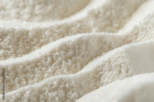 A close-up shot of a super absorbent polymer powder, potential for absorbing large volumes of liquid, useful in agricultural and hygiene products