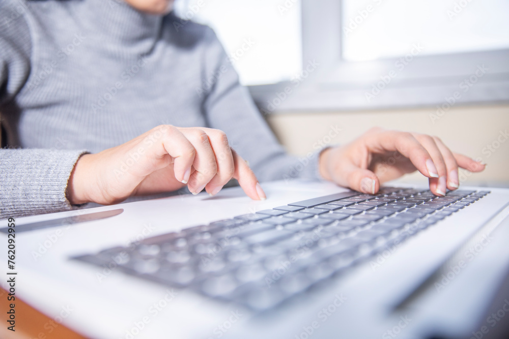 close up of woman hand typing on keyboard close up of woman hand typing on keyboard