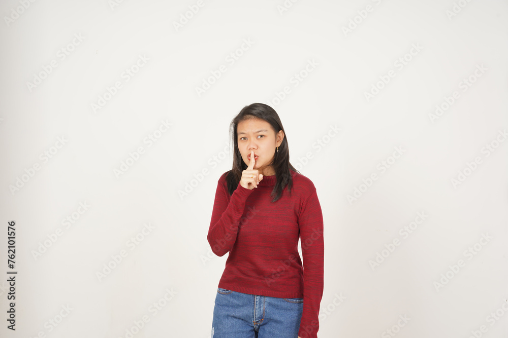 Young Asian woman in Red t-shirt Silent Shh, Don't be noise isolated on white background Young Asian woman in Red t-shirt Silent Shh, Don't be noise isolated on white background