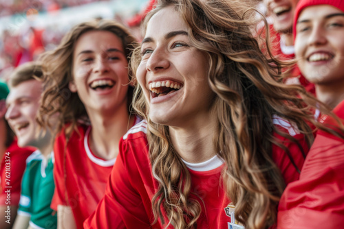 Hungarian football soccer fans in a stadium supporting the national team, Nemzeti Tizenegy 
 photo