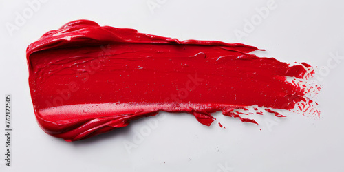 thick red lipstick swatch on white background,  red color cosmetic product brush stroke , red paint brush stroke , red watercolor brush stroke photo