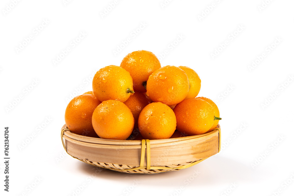 ripe cumquat or kumquat fruit isolated on white background