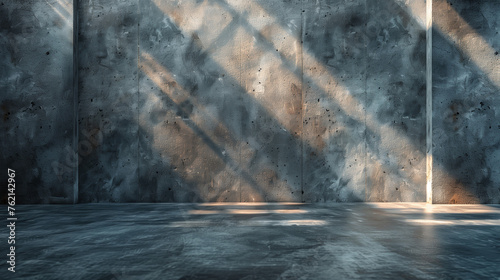 Concrete wall and floor are bathed in the focused beams of spotlights, creating a mesmerizing display of light and shadow