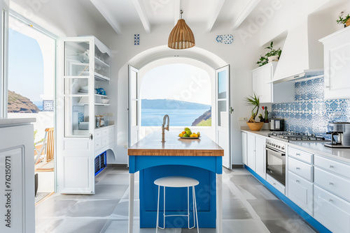 A large white kitchen with a view of the ocean