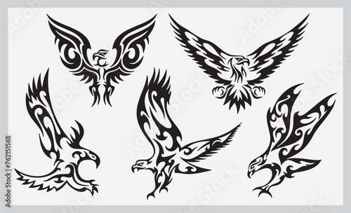 Vector illustrations set of attacking tribal eagles, great for vehicle graphics, stickers and t-shirt designs. Cartoon mascot characters, ready for vinyl cutting. © Vallentin Vassileff