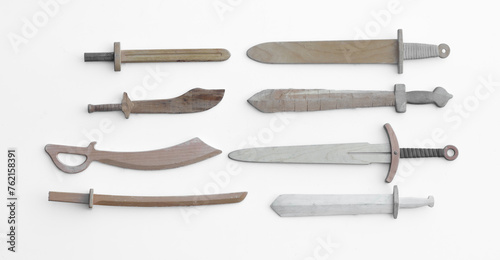 collection of wooden swords isolated on white background