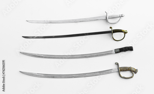 фотографія collection of sabers isolated on white background