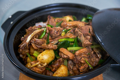 A pot of delicious braised duck with water chestnuts, home cooking