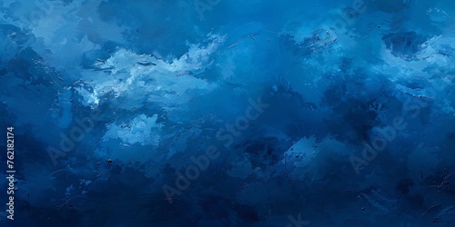 Abstract dark blue background with soft clouds