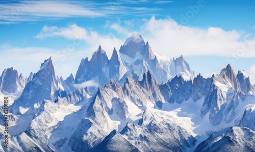 Snowy mountain peaks cutting the horizon  © Pumapala