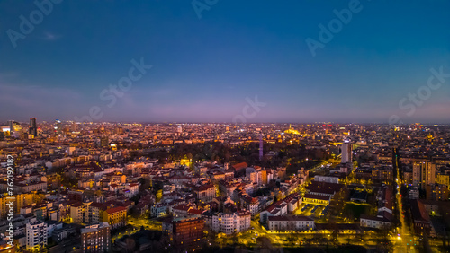 Beautiful panoramic aerial view of Milan city at sunset. Metropolis concept.