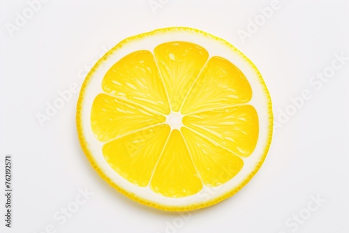 a lemon slice on a white background © Maria