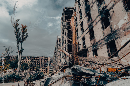 destroyed and burned houses in the city during the war in Ukraine © Sofiia