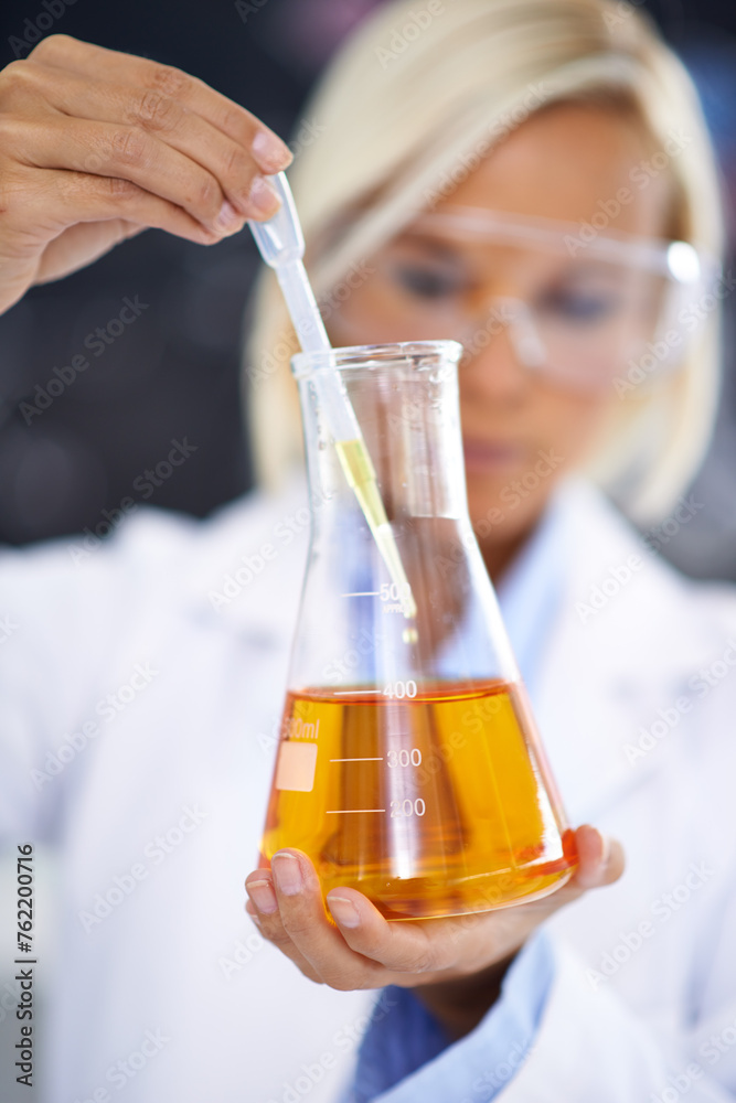 Science, study and woman with liquid in beaker for medical research, vaccine innovation or analysis. Laboratory, medicine and scientist with solution in glass for safety test, exam or investigation Science, study and woman with liquid in beaker for medical research, vaccine innovation or analysis. Laboratory, medicine and scientist with solution in glass for safety test, exam or investigation