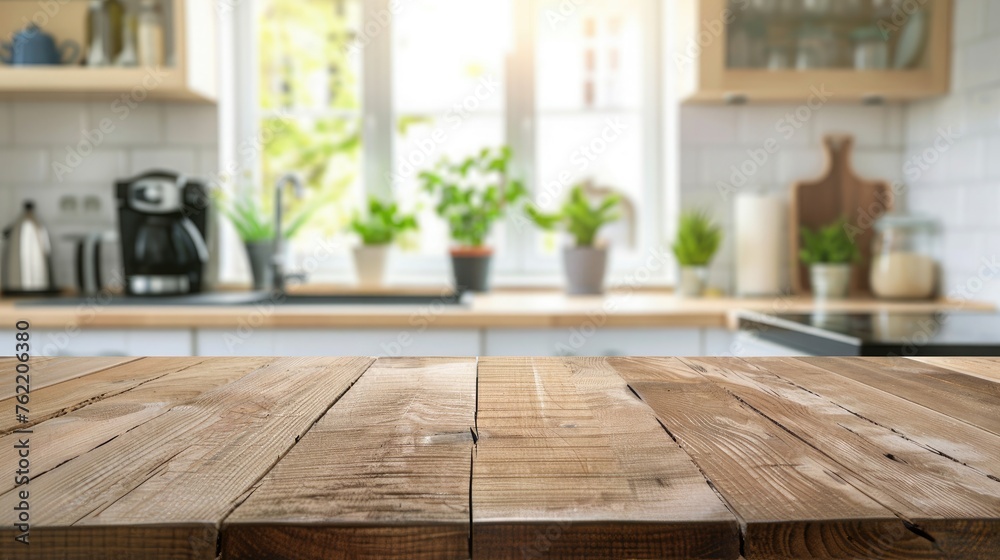 Empty wooden table and blurred background of modern kitchen, product display montage Empty wooden table and blurred background of modern kitchen, product display montage