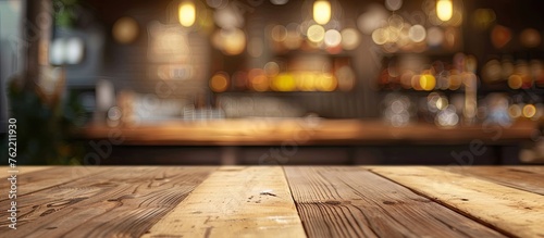 A beautiful hardwood table with a wood stain finish, set against a blurred background of a bar. The flooring resembles asphalt road surface, with a cloudy sky in the backdrop