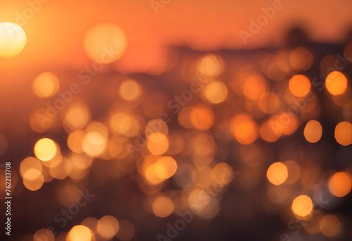 Abstract orange sunset bokeh background. Blurry shiny orange light color abstract background.