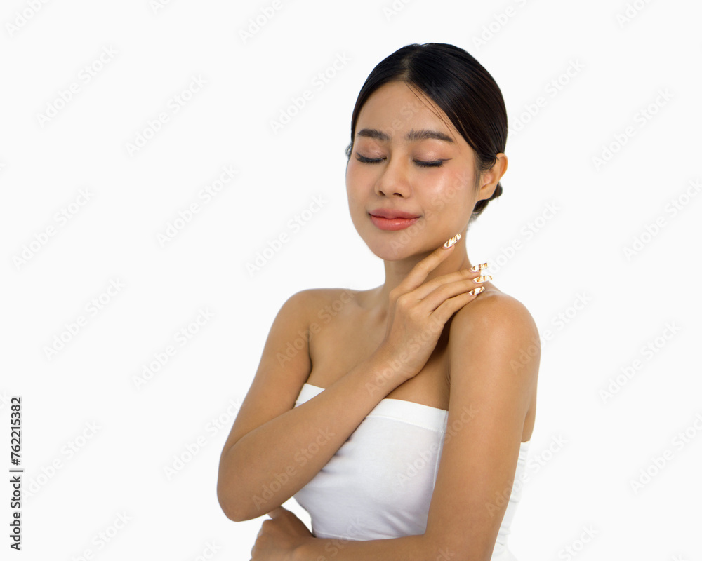 Portrait of beautiful young asian clean fresh skin woman. Bare shoulders. Hand touches chin. Isolated. Portrait of beautiful young asian clean fresh skin woman. Bare shoulders. Hand touches chin. Isolated.
