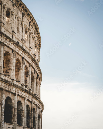 Iconic Roman Colosseum on a sunny day in Rome, Italy © Wirestock