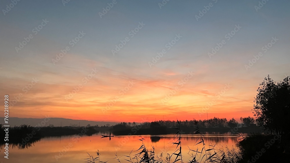 Golden Sunset Reflected in Serene Lake Golden Sunset Reflected in Serene Lake