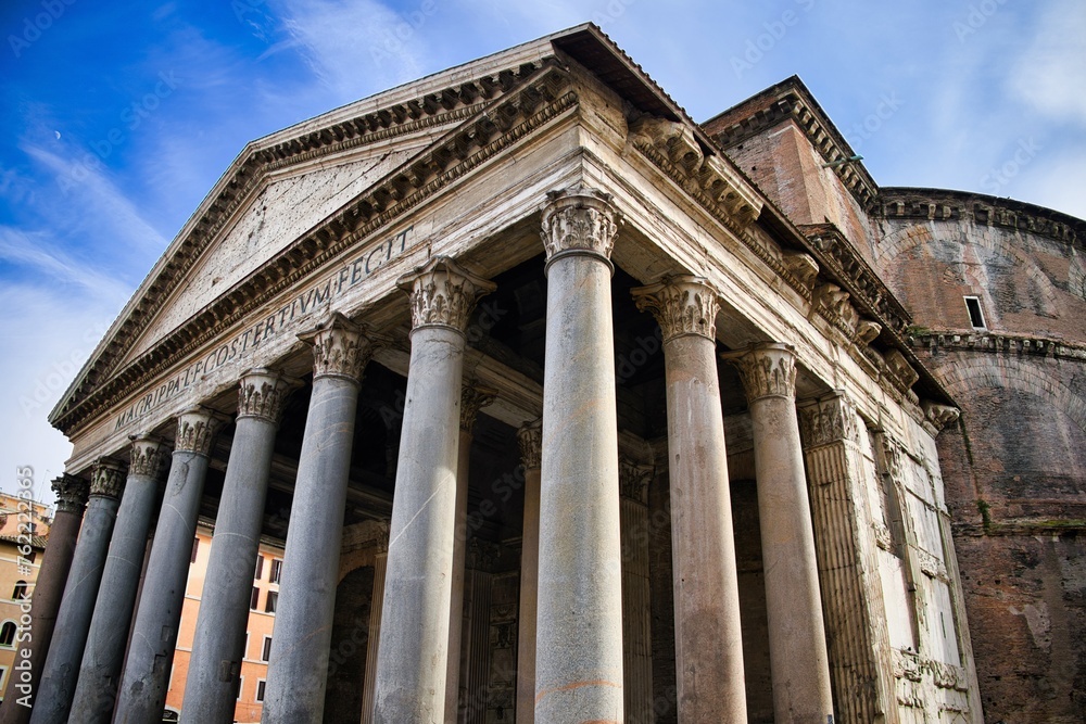 Roman Pantheon at daylight with vibrant blue sky. Rome, Italy
