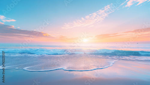Serene sunrise over a tranquil ocean with gentle waves touching a sandy beach under a pastel-colored sky.