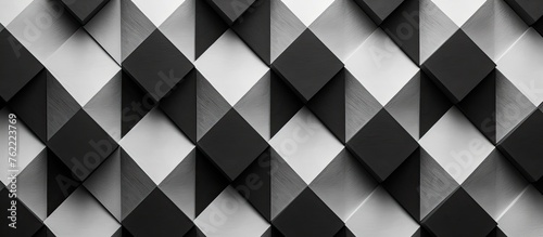 A monochromatic photo featuring a black and white checkered pattern on the floor, creating a striking contrast in hues with a sense of symmetry