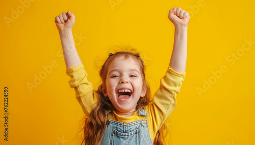 little girl with hands up © The Stock Photo Girl