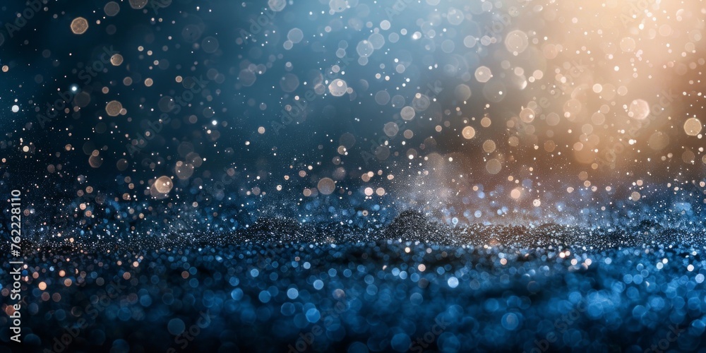Glittering circles of light with a bokeh effect on a dark blue background. Glittering circles of light with a bokeh effect on a dark blue background.
