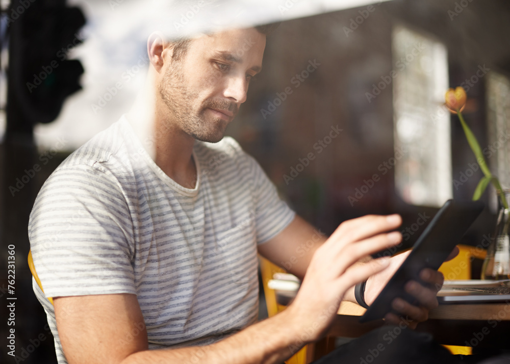 Fototapeta premium Man, tablet and coffee shop for networking, online communication and website for information. Male person, cafe and app for conversation, social media and remote work in restaurant for research