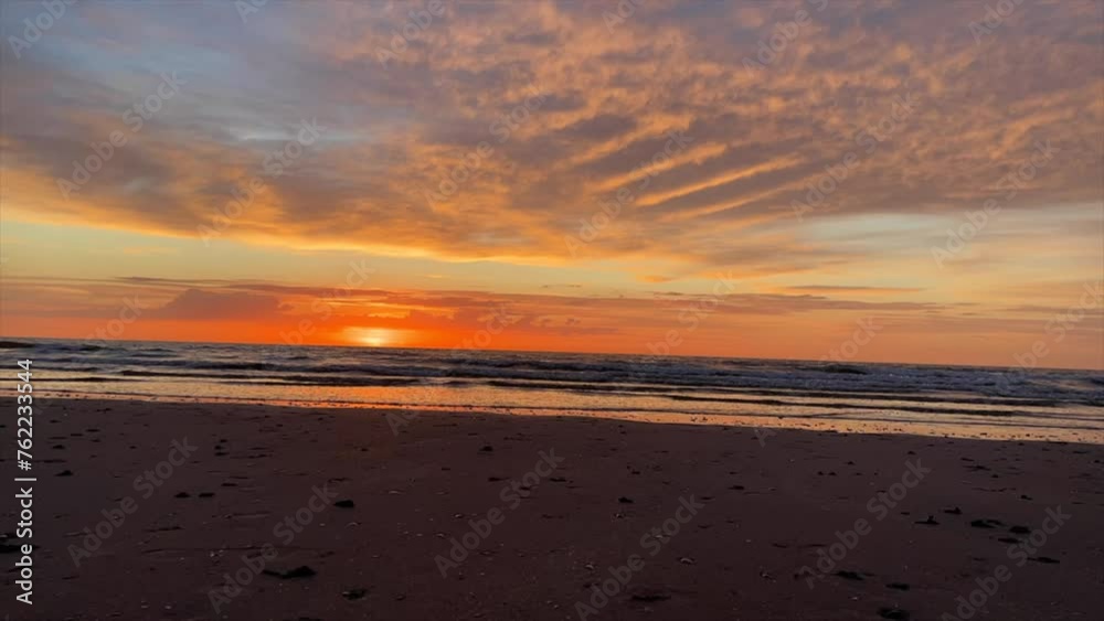 A timelapse of the sun just before going down in the sea A timelapse of the sun just before going down in the sea