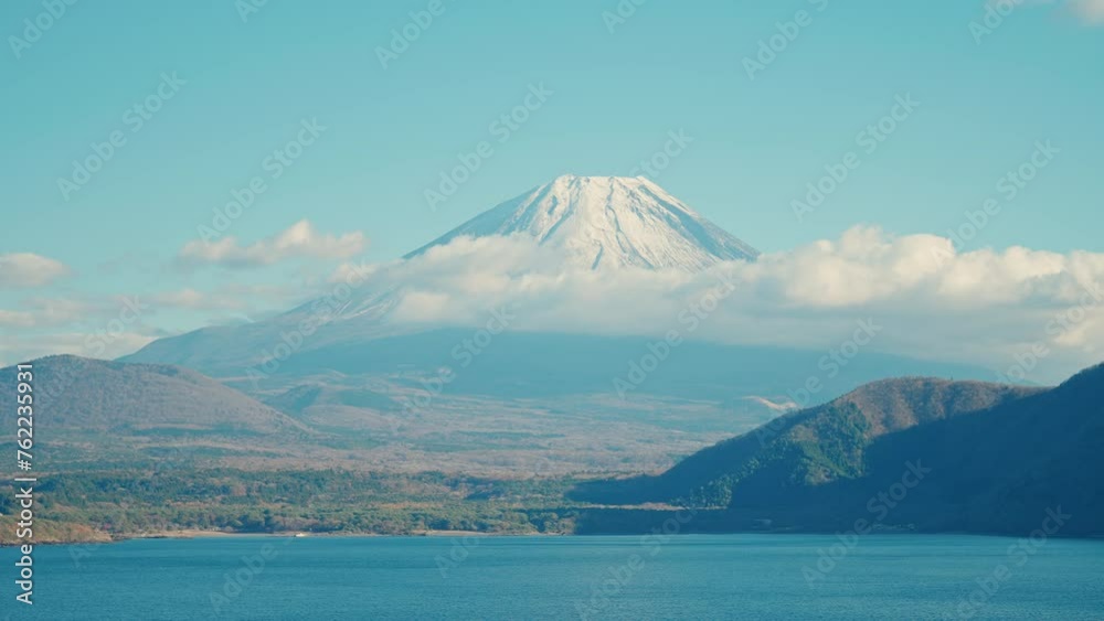 Mount Fuji at lake Motosu near Kawaguchiko, one of the Fuji Five Lakes located in Yamanashi, Japan. Landmark for tourists attraction. Japan Travel, Destination, Vacation and Mount Fuji Day concept Mount Fuji at lake Motosu near Kawaguchiko, one of the Fuji Five Lakes located in Yamanashi, Japan. Landmark for tourists attraction. Japan Travel, Destination, Vacation and Mount Fuji Day concept