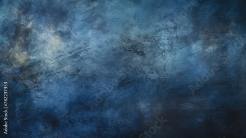 A dark blue wall with a grunge effect. Textured abstract background, backdrop