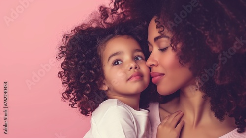 Afro- american(black woman) Mother and little kid daughter isolated on pastel background, Mother's Day love family parenthood childhood concept 