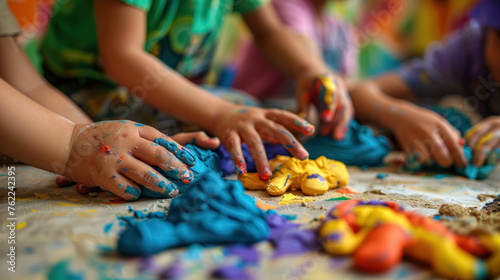 Kid Create Things With Modeling Clay Of Different Colors. Focus View On The Hands. Tactile Experience. Fun And Creativity Of Children
