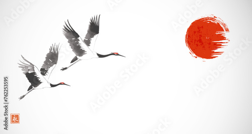 Ink wash painting with cranes in flight and big red sun. Traditional oriental ink painting sumi-e, u-sin, go-hua. Hieroglyph - eternity