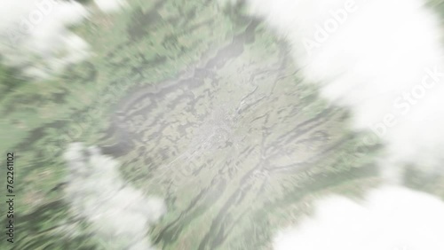 Earth zoom in from space to La Chaux-de-Fonds, Switzerland. Followed by zoom out through clouds and atmosphere into space. Satellite view. Travel intro. Images from NASA