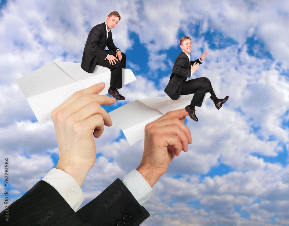 Collage with two hands launches paper planes in window on which businessmans sits, business risk concept Collage with two hands launches paper planes in window on which businessmans sits, business risk concept