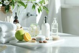 Bath and cosmetic products with almond extract and fruit and toiletries on white table in bathroom. Elevated view. Horizontal composition.