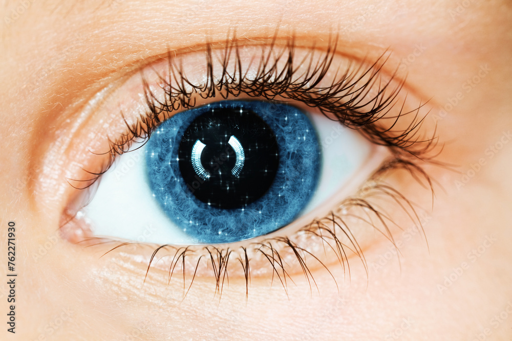 Fototapeta premium Little stars in the iris of the eye, close-up, collage