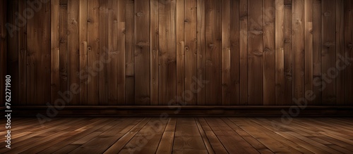 An empty room inside a brown wooden building, featuring wooden walls, flooring stained in an amber hue. The sole fixture is a wooden door © 2rogan