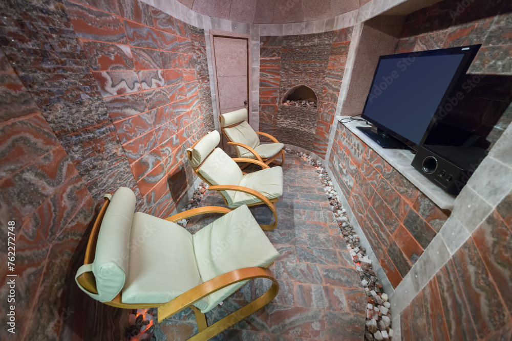Φωτογραφία Three rocking-chairs and TV in marble surface cabin at the Rehabilitation Center Fire and Rescue